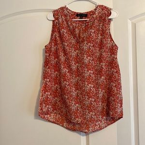 Size L sleeveless blouse
